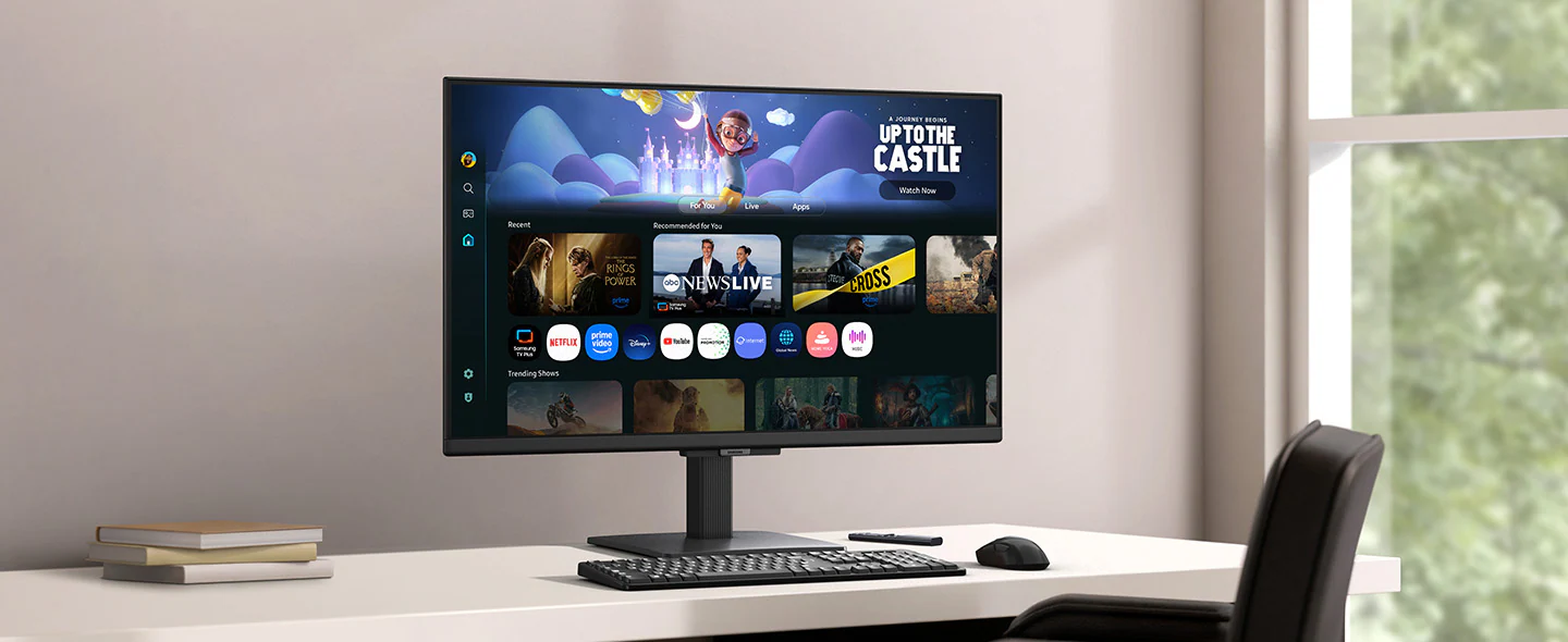 Màn hình trên bàn hiển thị trang Ứng dụng Smart TV với nhiều nội dung và ứng dụng được sắp xếp theo thứ tự.