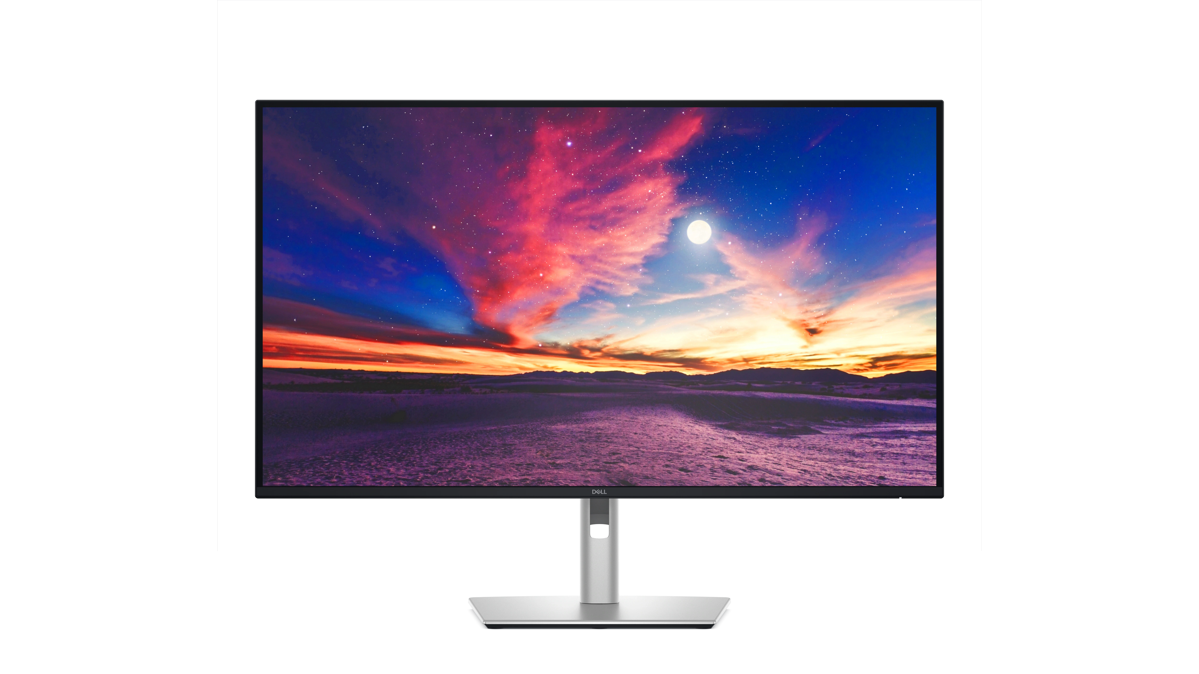 Màn hình Dell Pro 4K Plus 4K USB-C Hub với hình ảnh tràn màn hình hiển thị sa mạc và bầu trời đầy màu sắc.